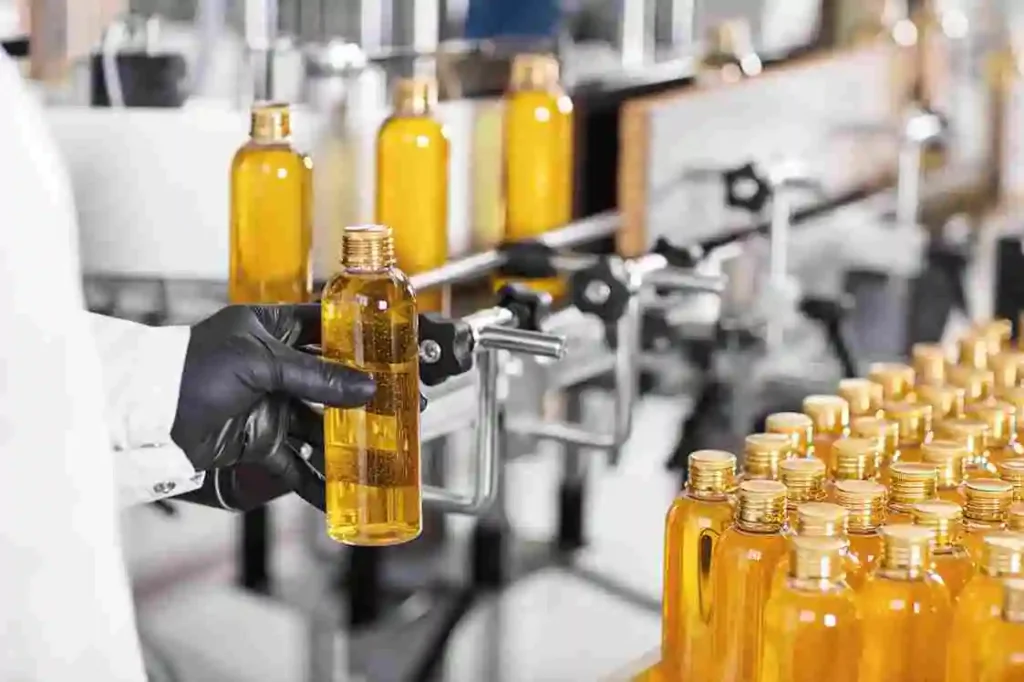Rooh Etibb herbal oil bottling and quality inspection process